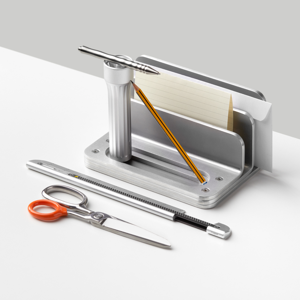 Graphic depicting a hexagonal cropped photo of an interior room design with grid lines along its borders.